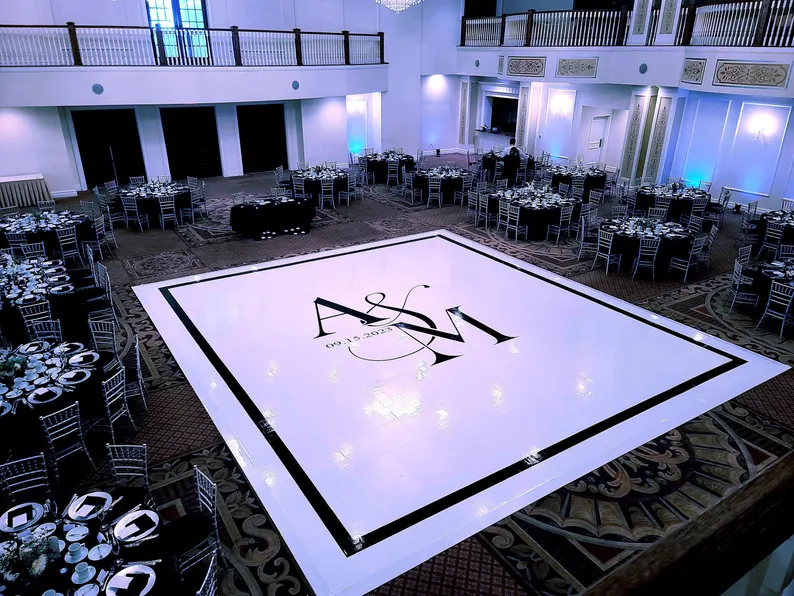 Complete custom decal dance floor wrap gloss white removable vinyl w/ printed center monogram logo initials, names and border trim design