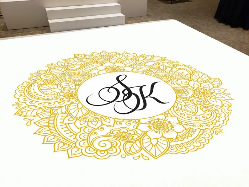 Custom decal dance floor wrap gloss white removable vinyl with printed monogram logo design in the center